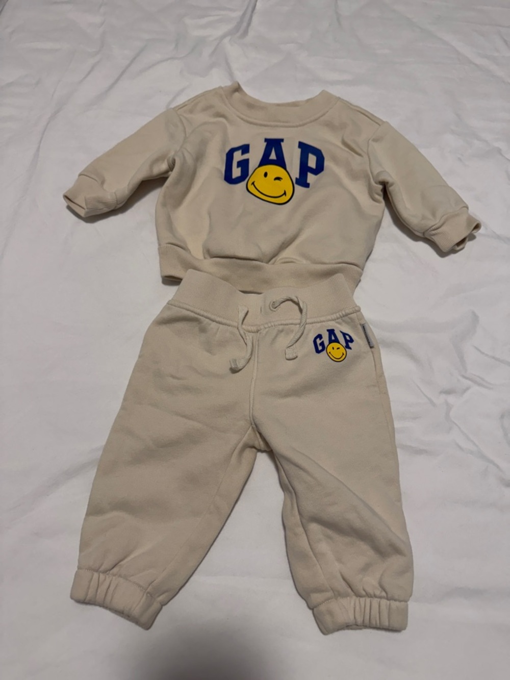 GAP Cream Two-Piece Sweatshirt & Jogger Set with Blue Logo and Yellow Smiley